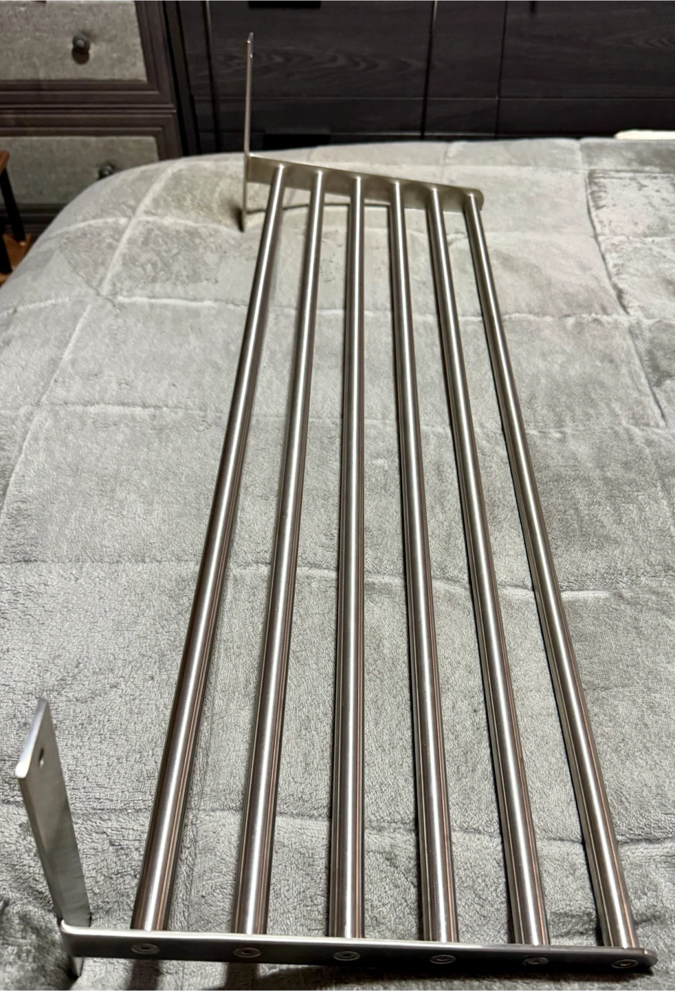 Stainless steel wall-mounted shelf