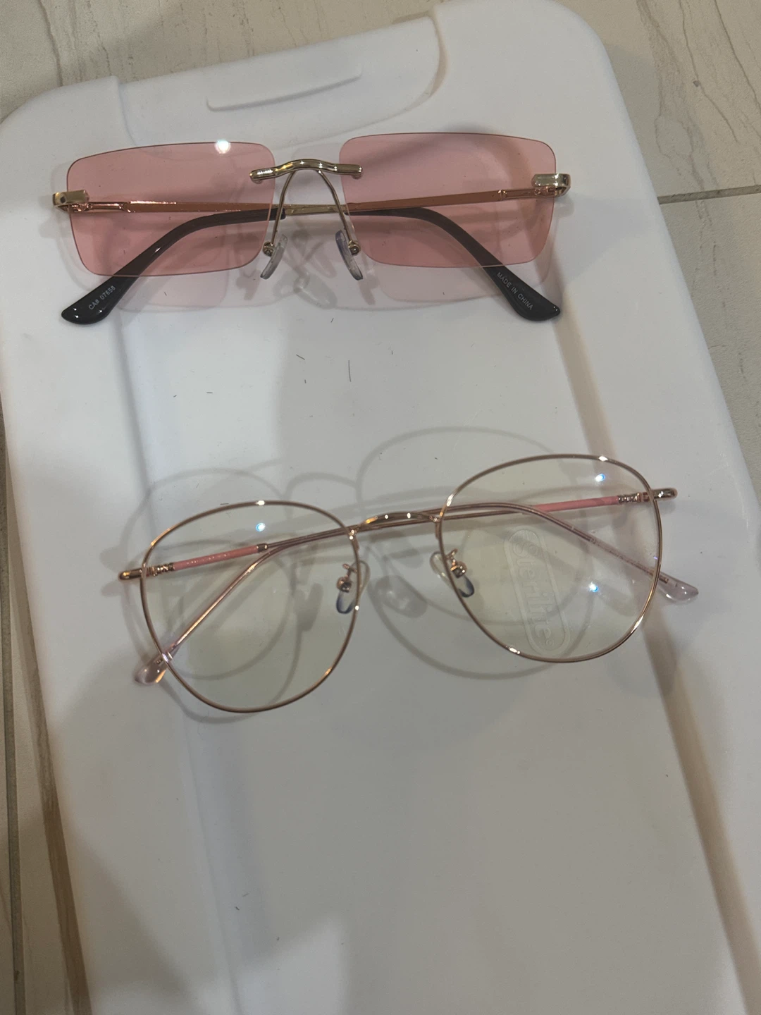 Two pairs of fashion eyewear