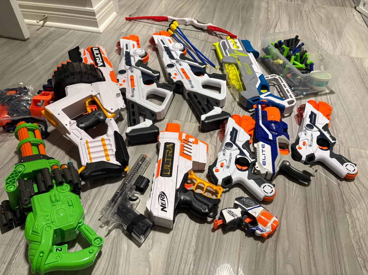 Large Collection of Nerf Blasters and Accessories