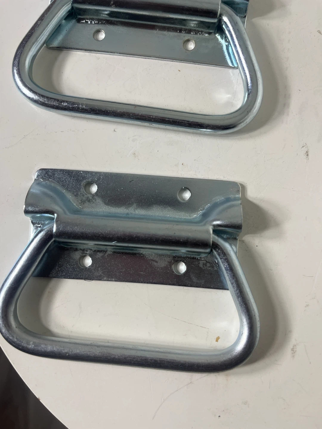 Two Metal Spring-Loaded Handles
