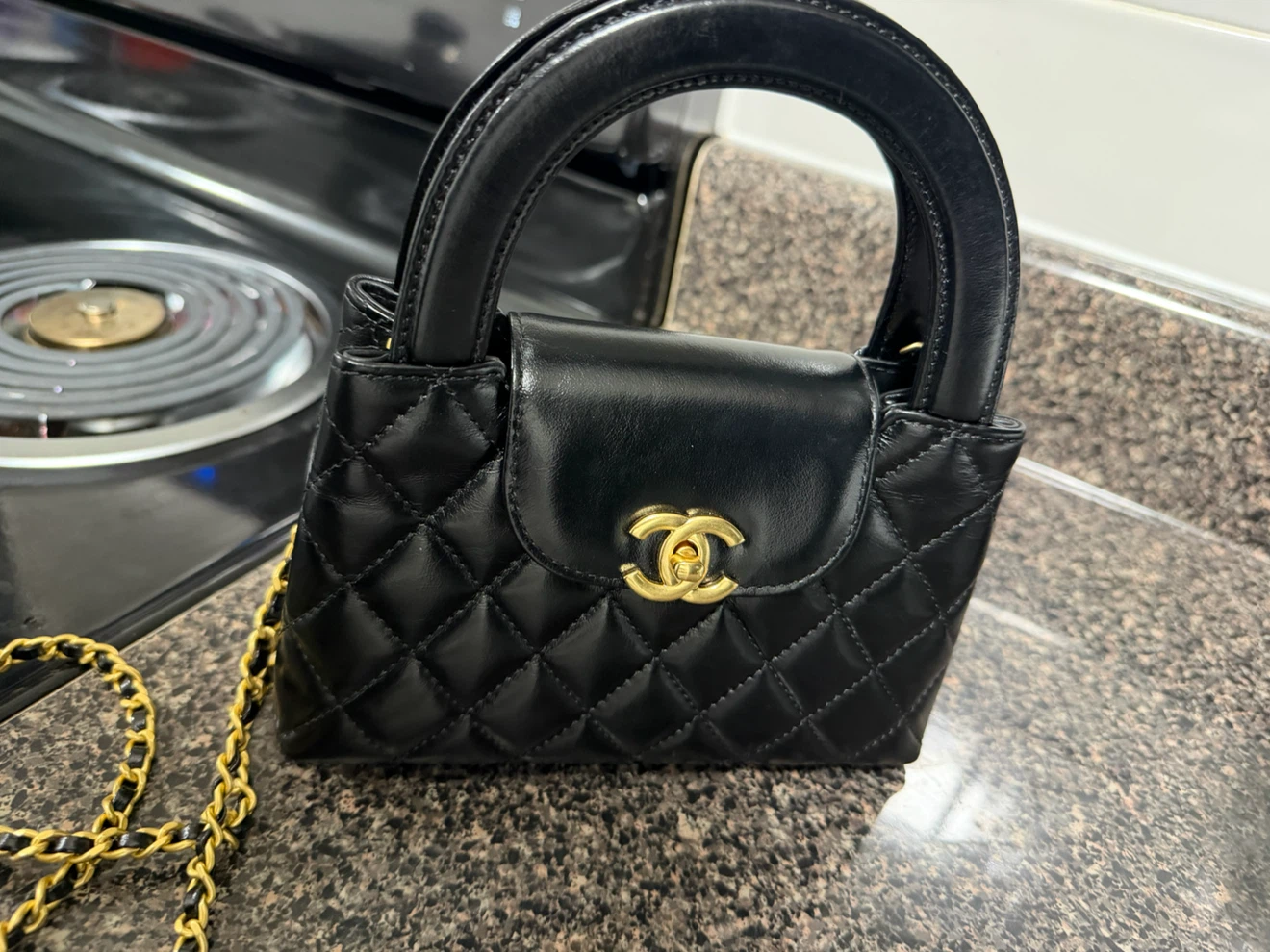 Chanel Quilted Leather Top Handle Bag
