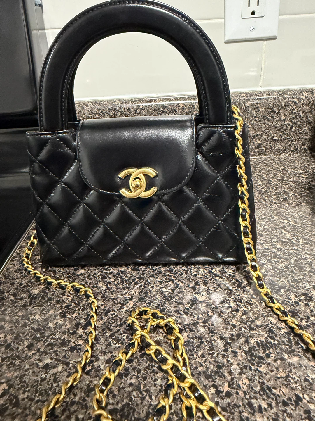 Chanel Quilted Leather Top Handle Bag - photo 4