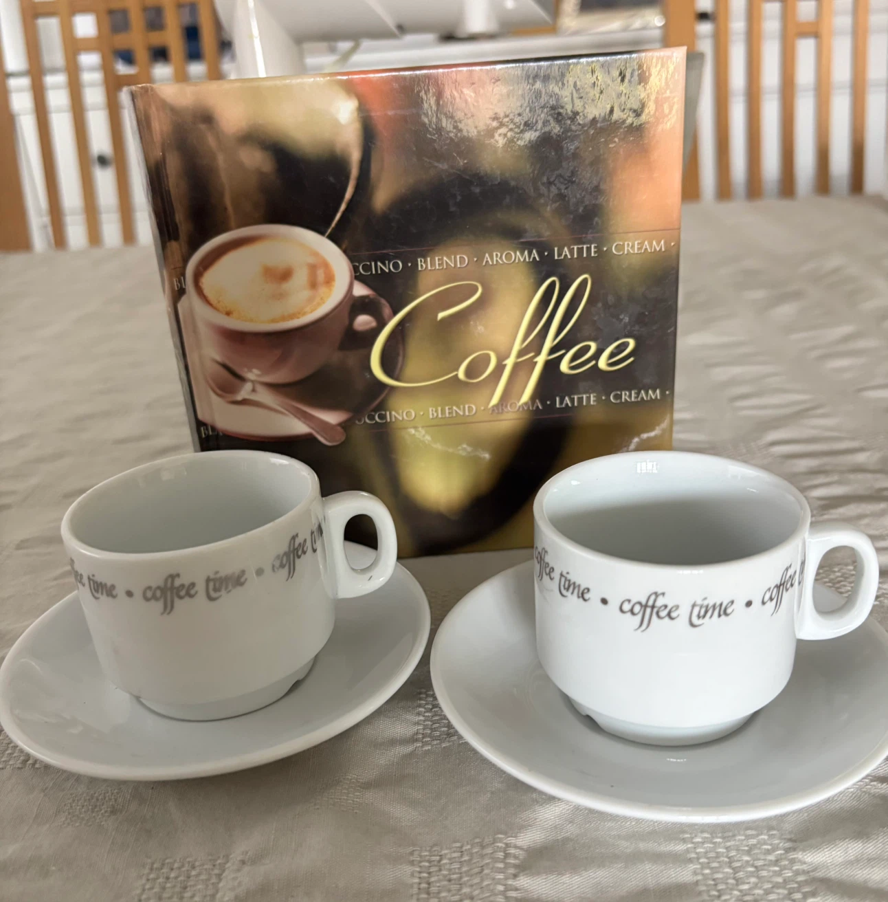 Set of Two Espresso Coffee Cups and Saucers and coffee book