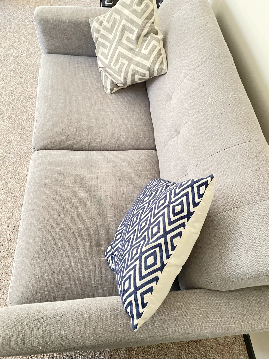 Light grey love seat and matching accent chair set
