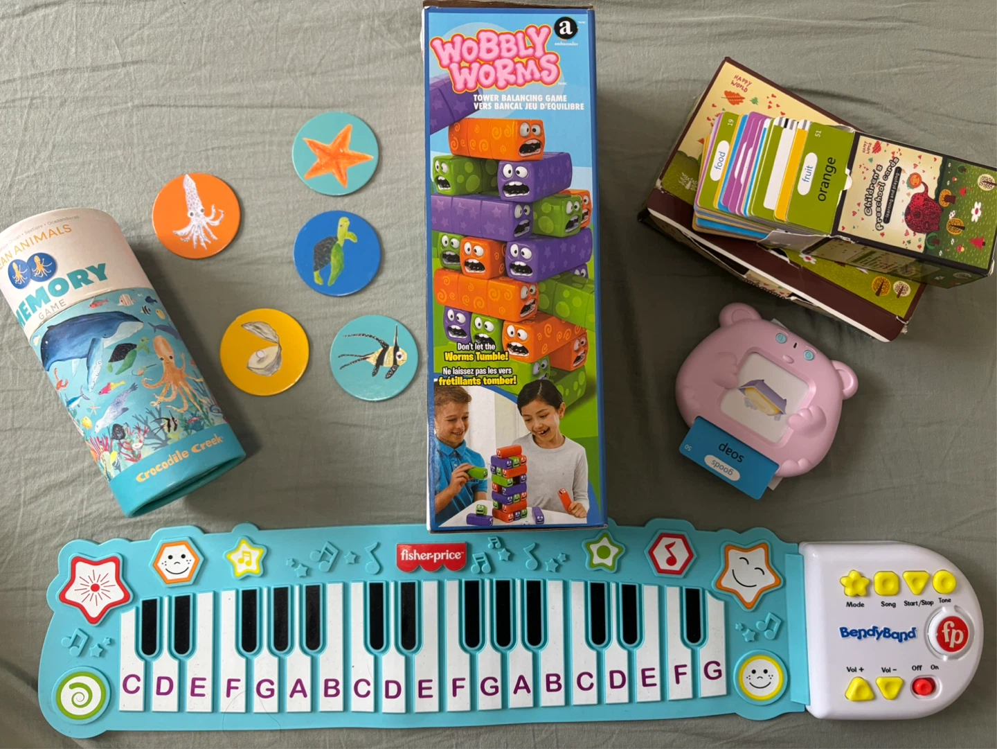 Fisher-Price Piano, Wobbly Worms Game, and Kids Toy Bundle