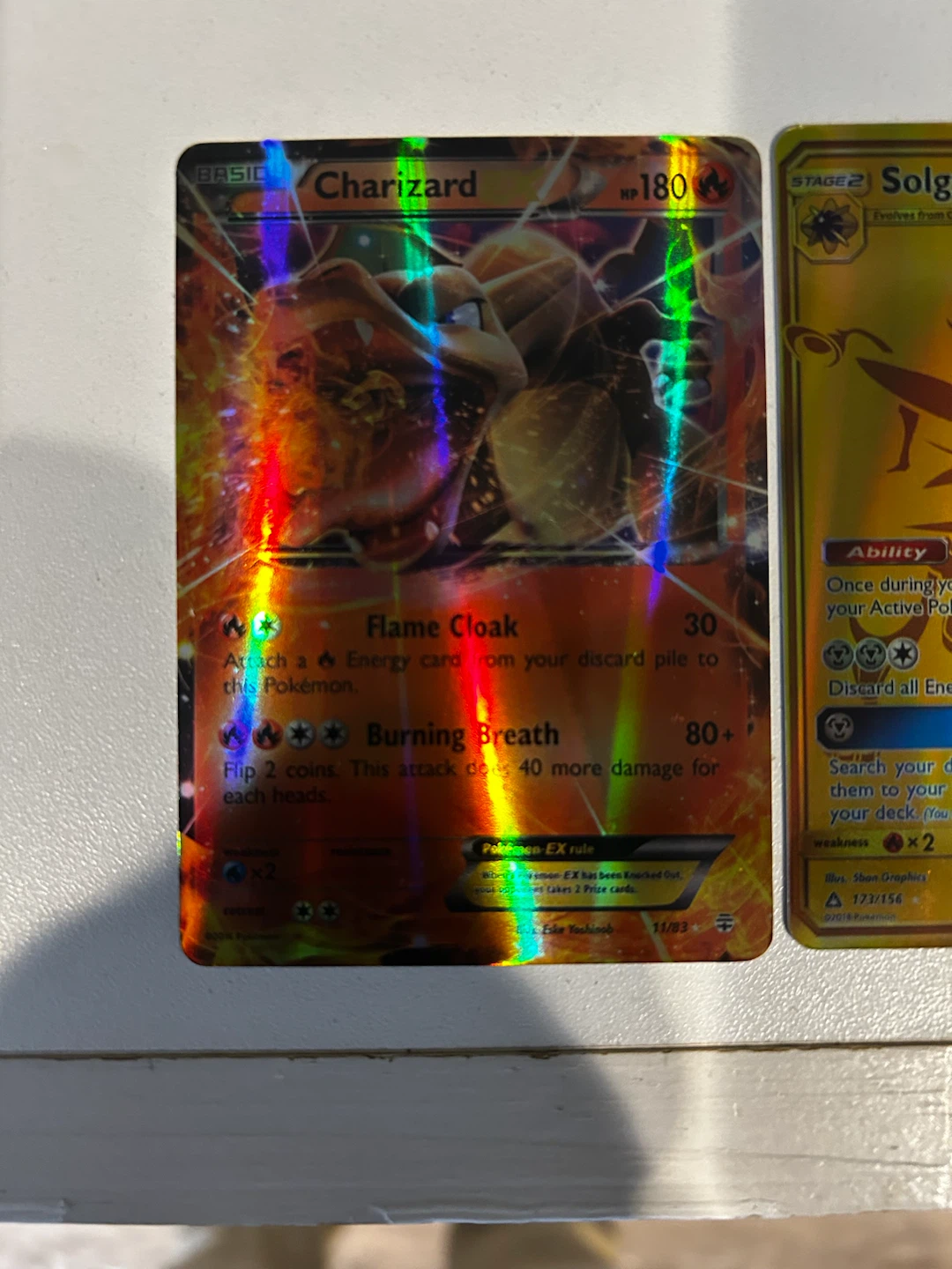 Pokemon Charizard and Solgaleo GX Trading Cards