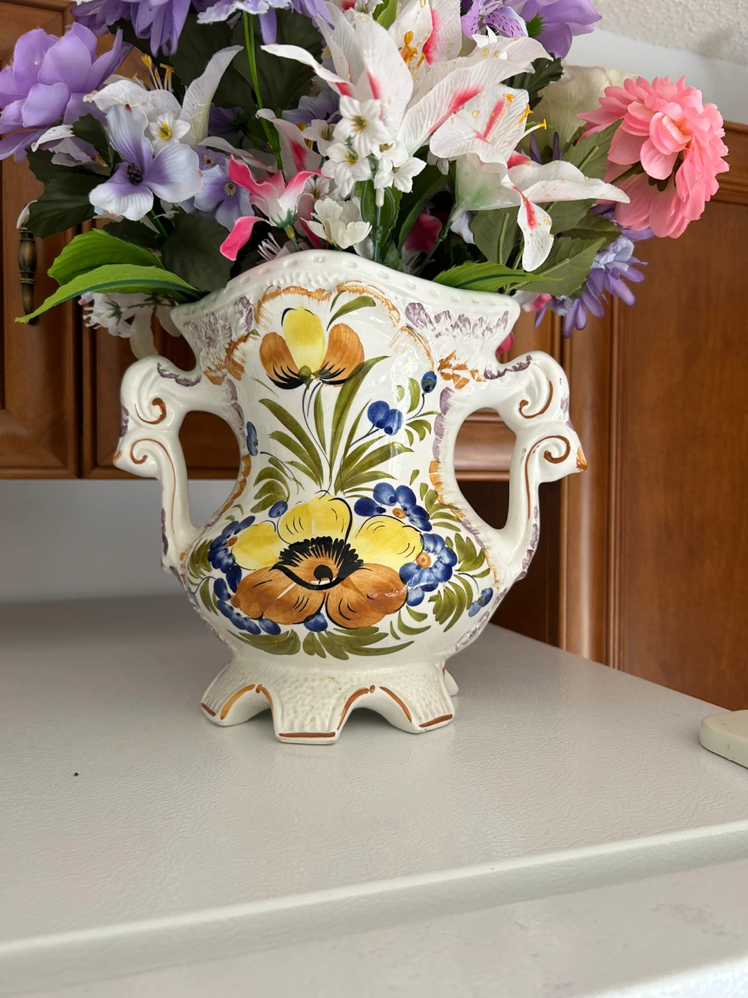 Decorative ceramic vase with floral design