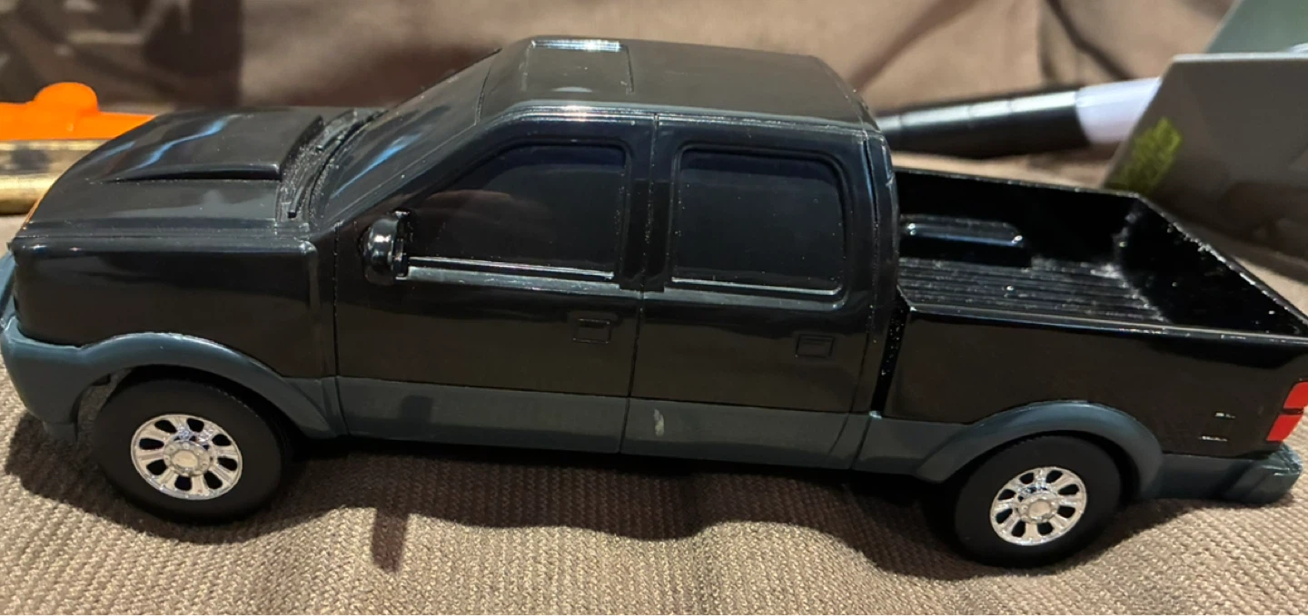 Black toy pickup truck