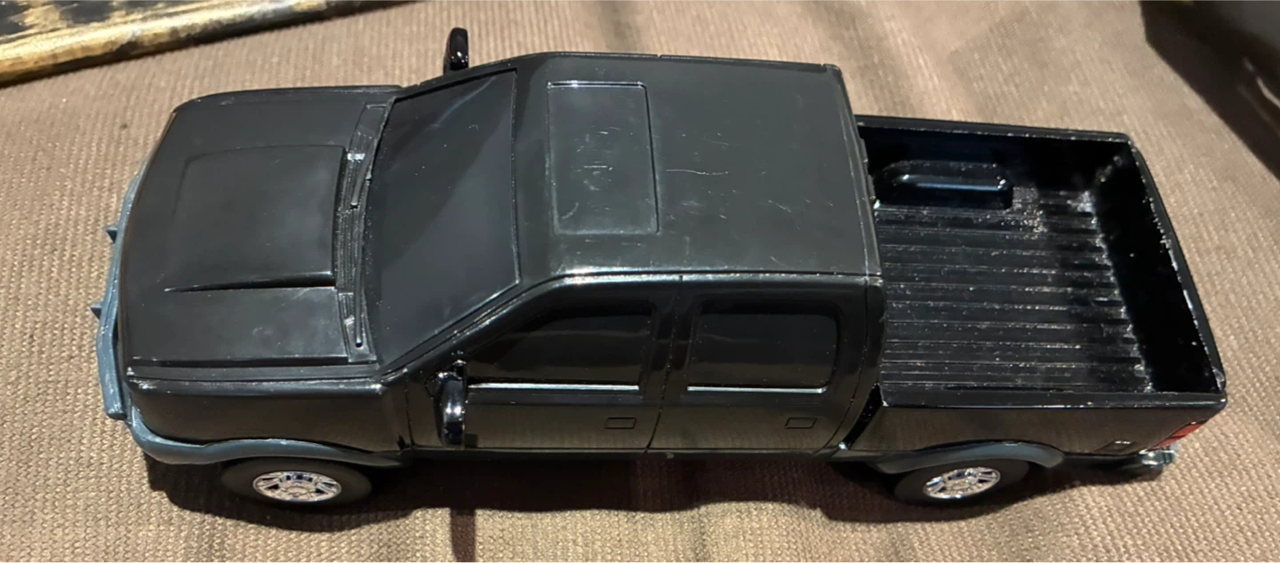 Black toy pickup truck - photo 2