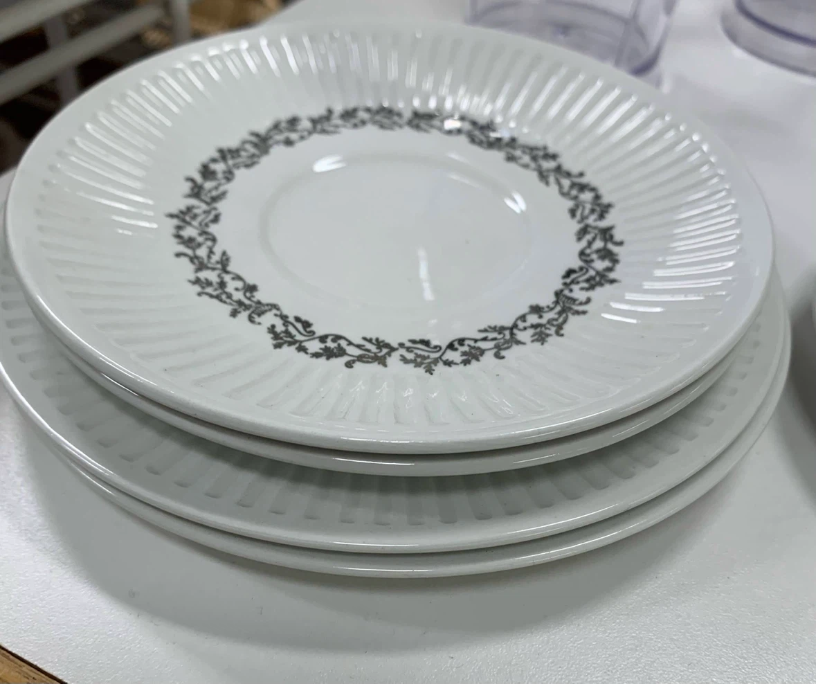 Set of 4 White Ceramic Saucers
