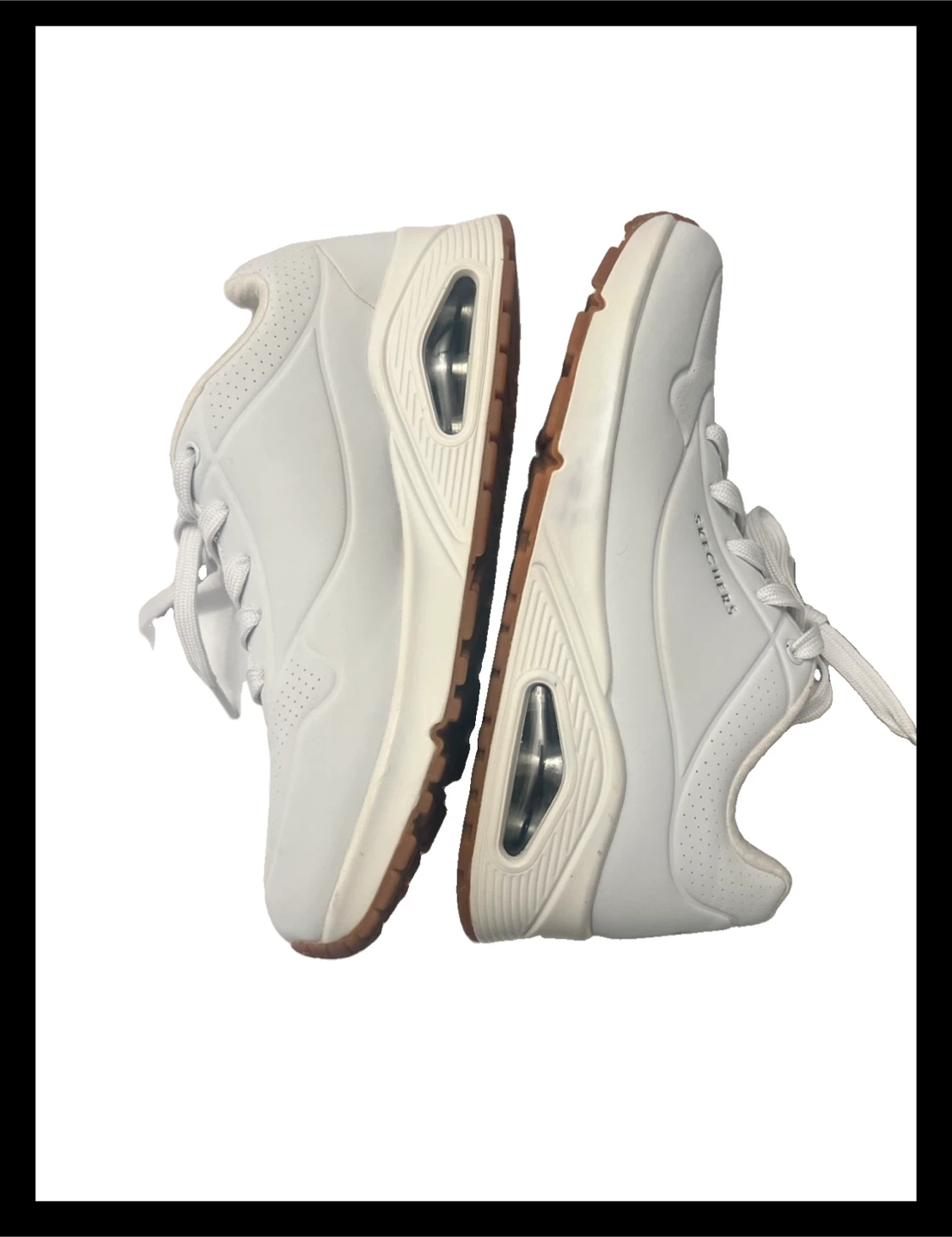 White Skechers Sneakers Stand on Air