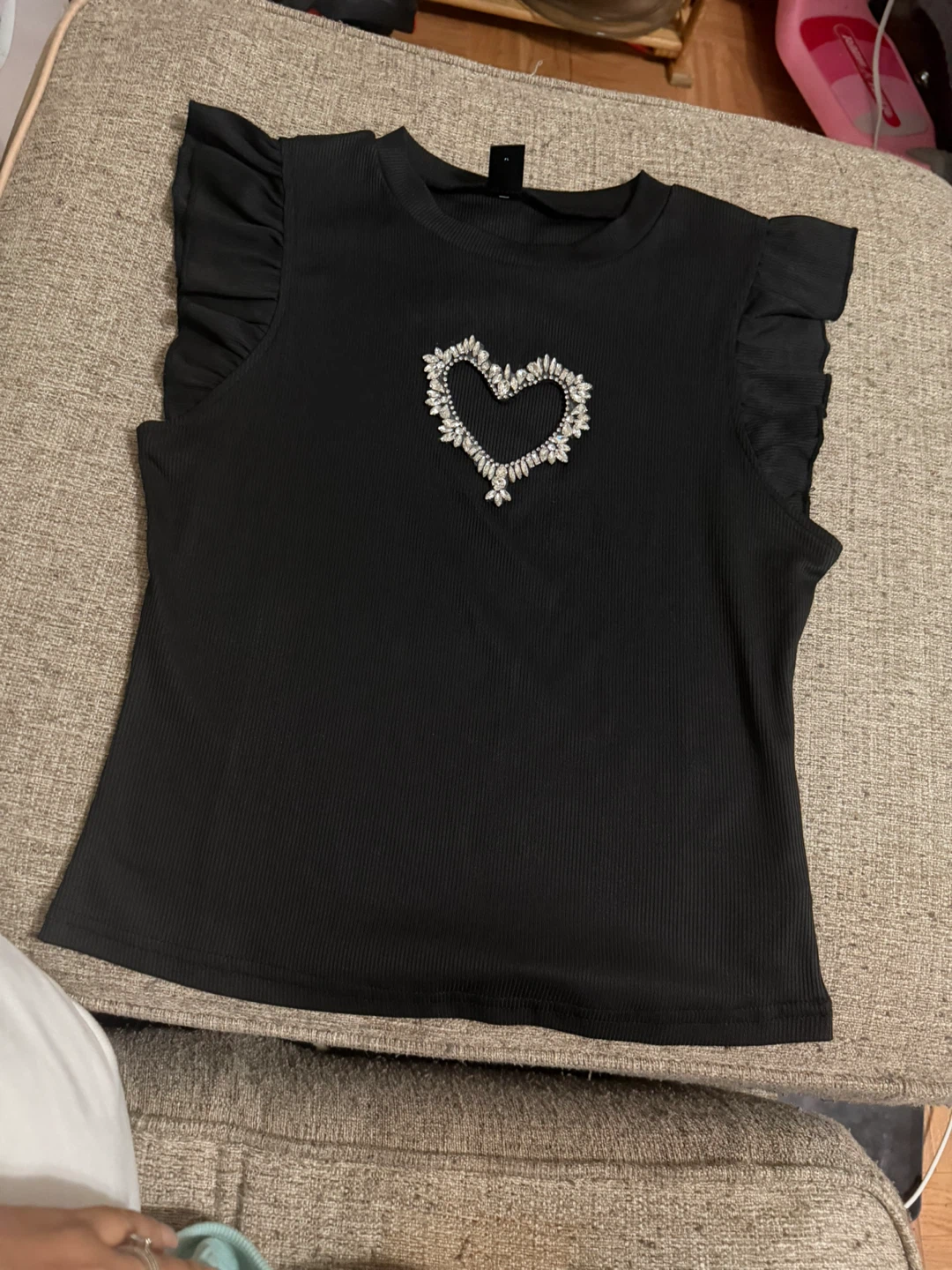 Black Ruffled Top with Rhinestone Heart Detail