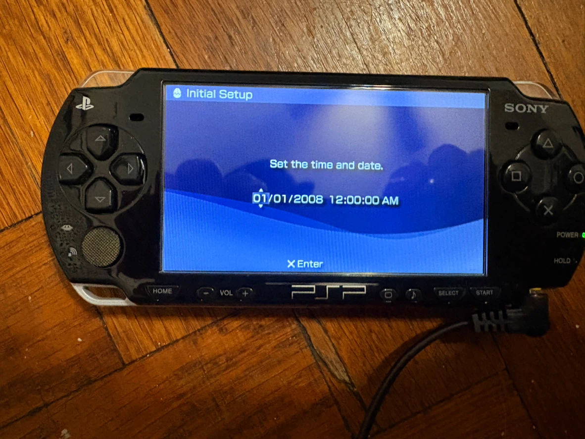 Sony PSP Console with Four Games and Case