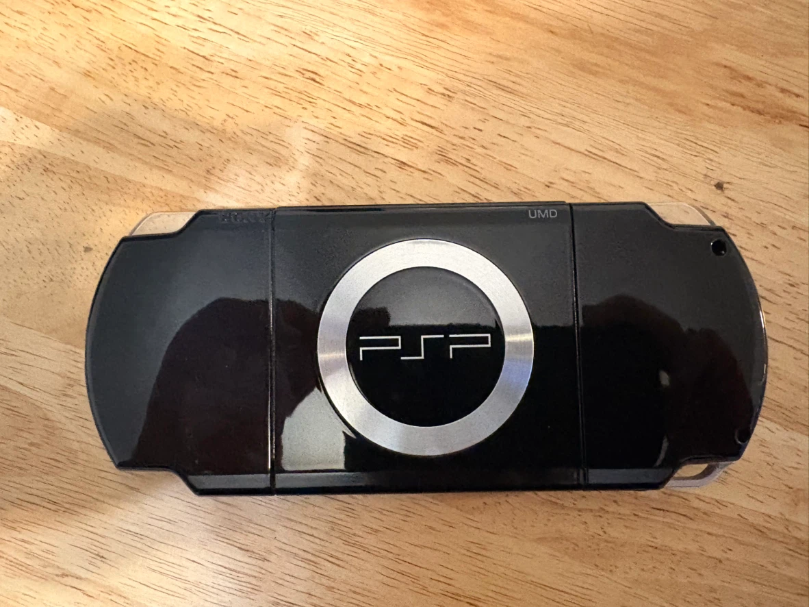 Sony PSP Console with Four Games and Case - photo 3