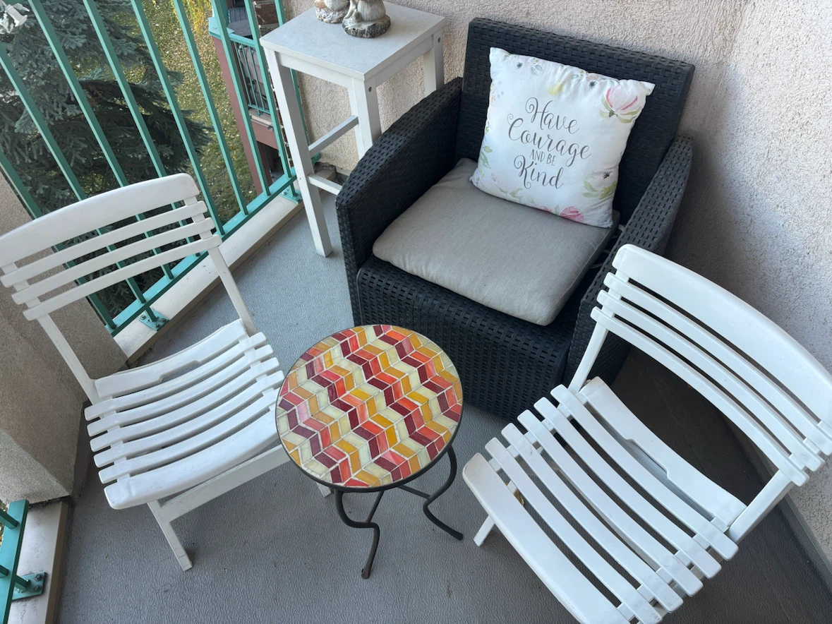 Mosaic Accent Table & white folding chairs