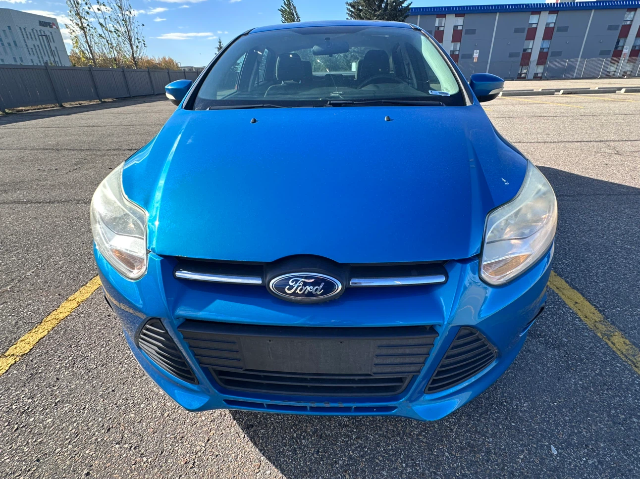 Blue Ford Focus SE Sedan - photo 3