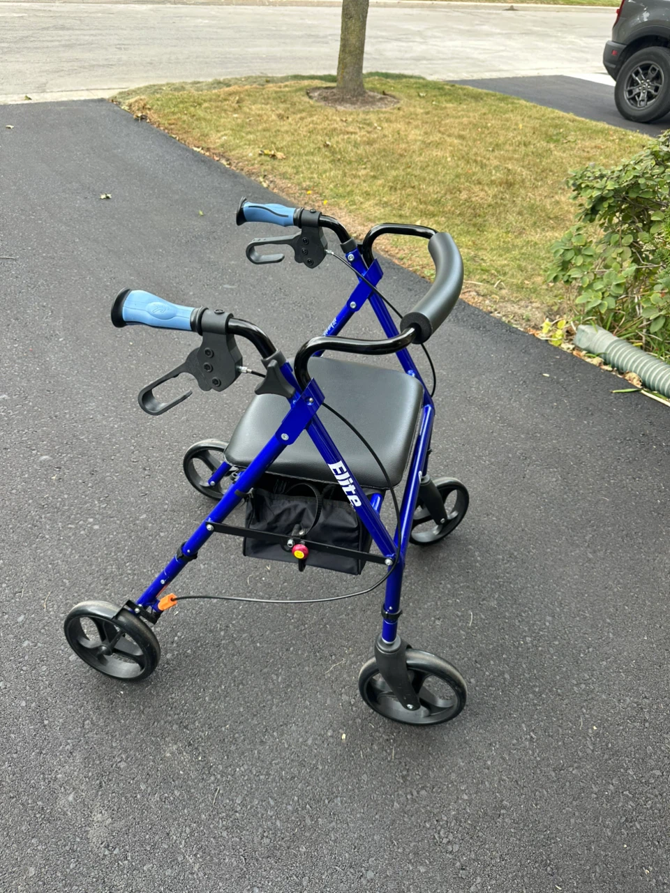 4 wheel walker with storage box like new
