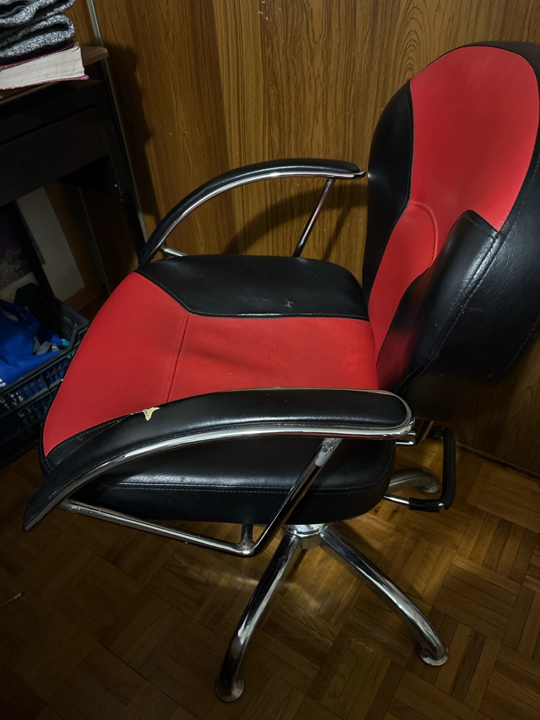 Red and black swivel chair