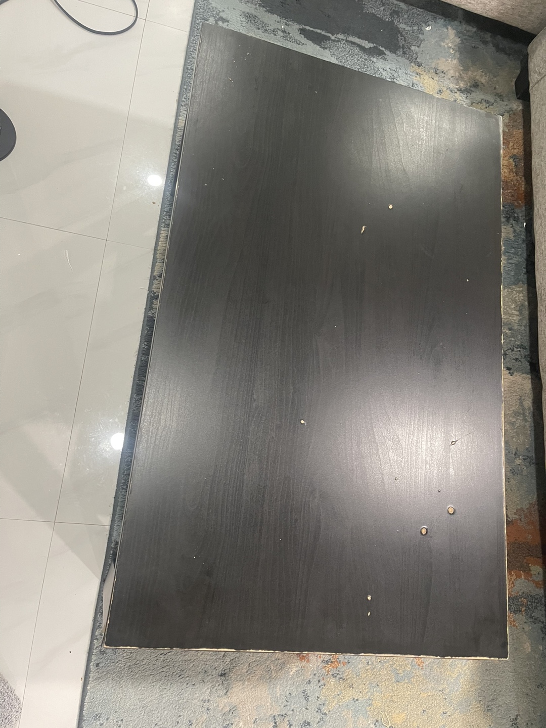 Black coffee table with lower shelf