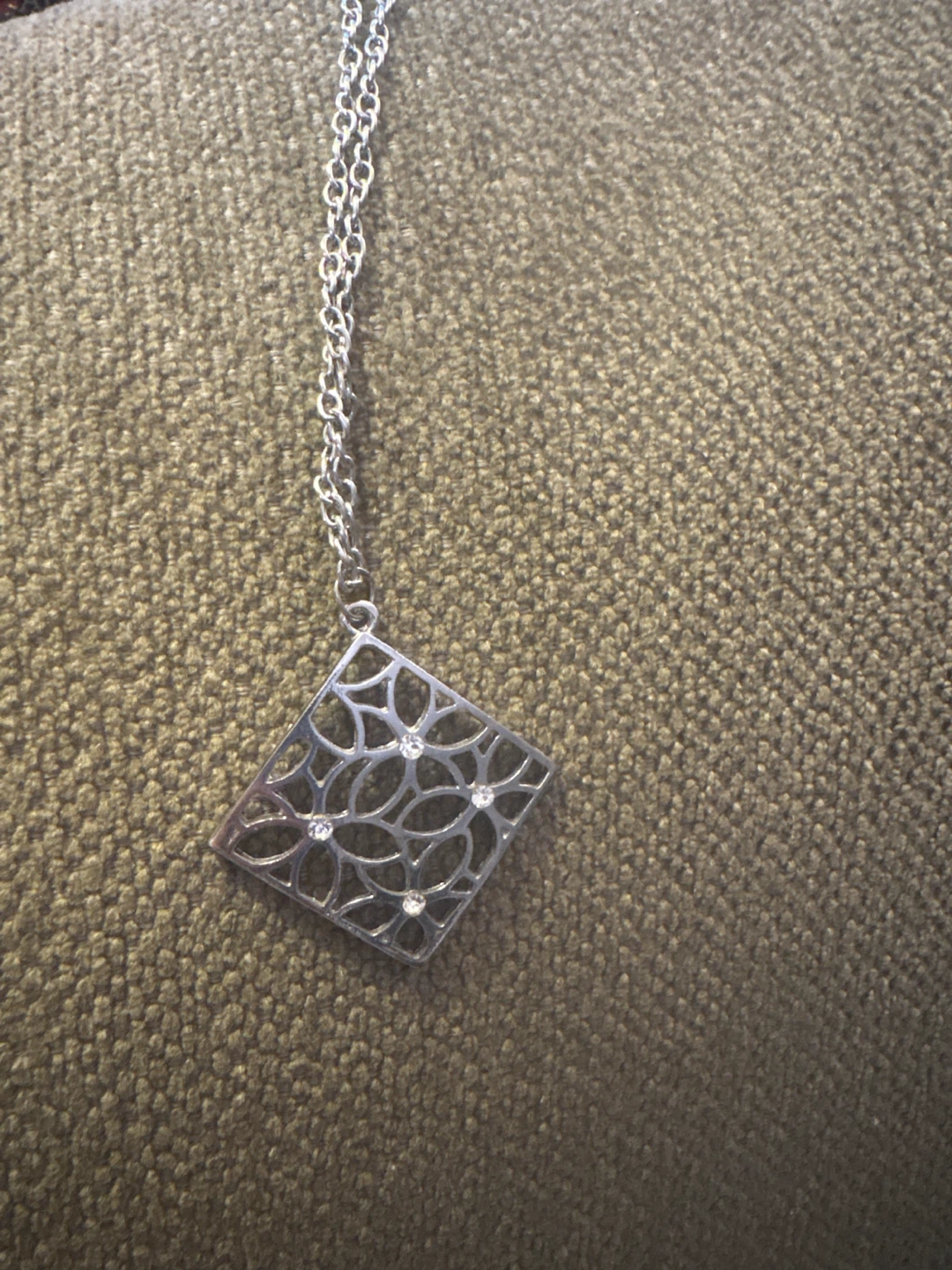 Silver-tone necklace with floral square pendant
