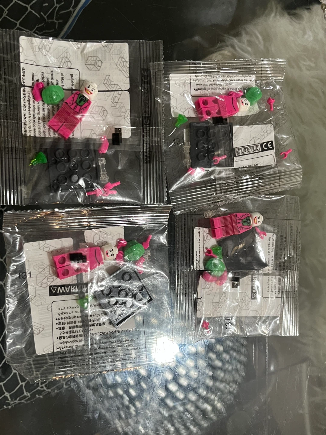 4 Sealed Joker Minifigure Packs