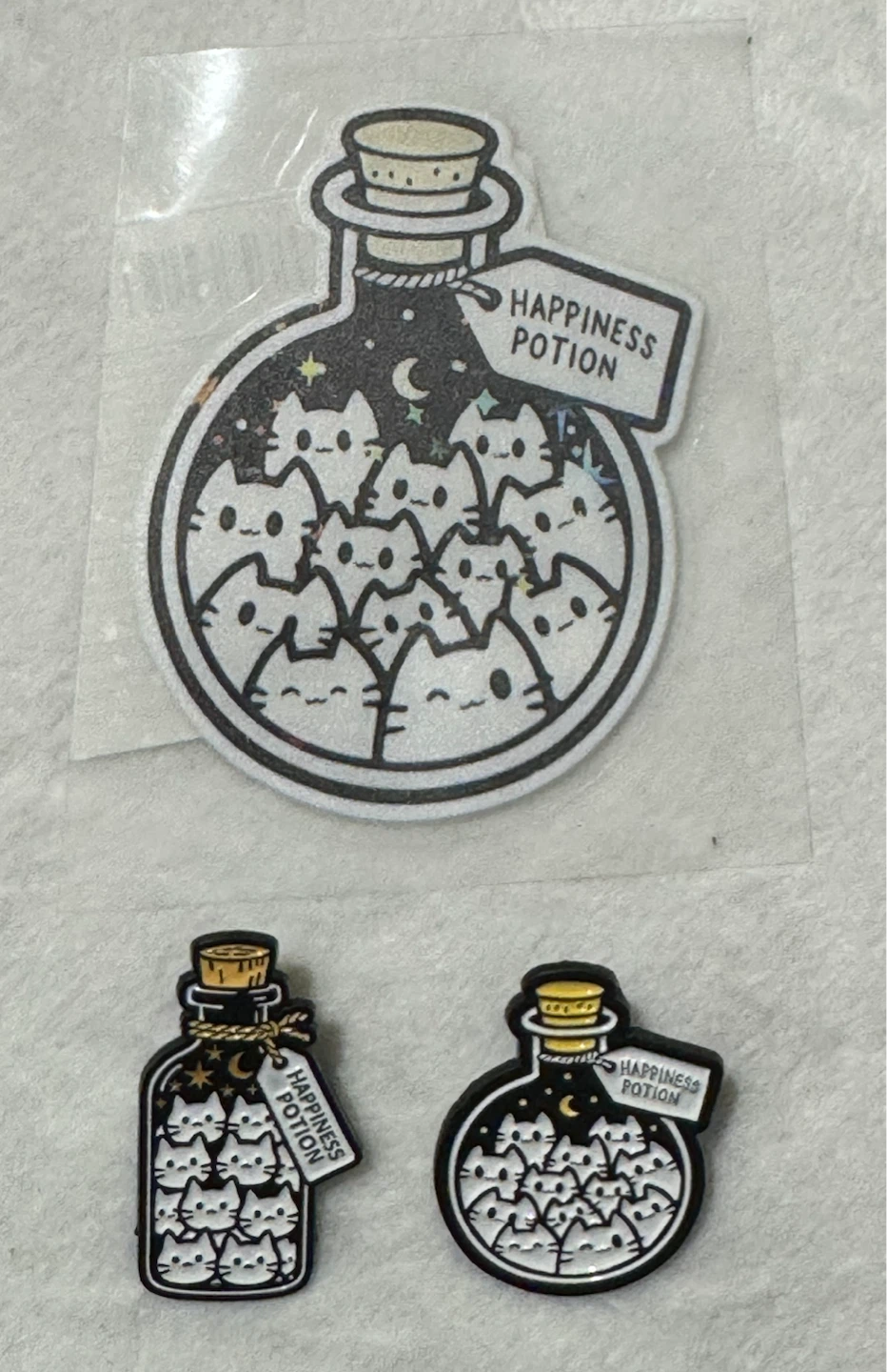 Set of 3 items (2 Happiness Potion Cat Pins and 1 Sticker) - photo 2