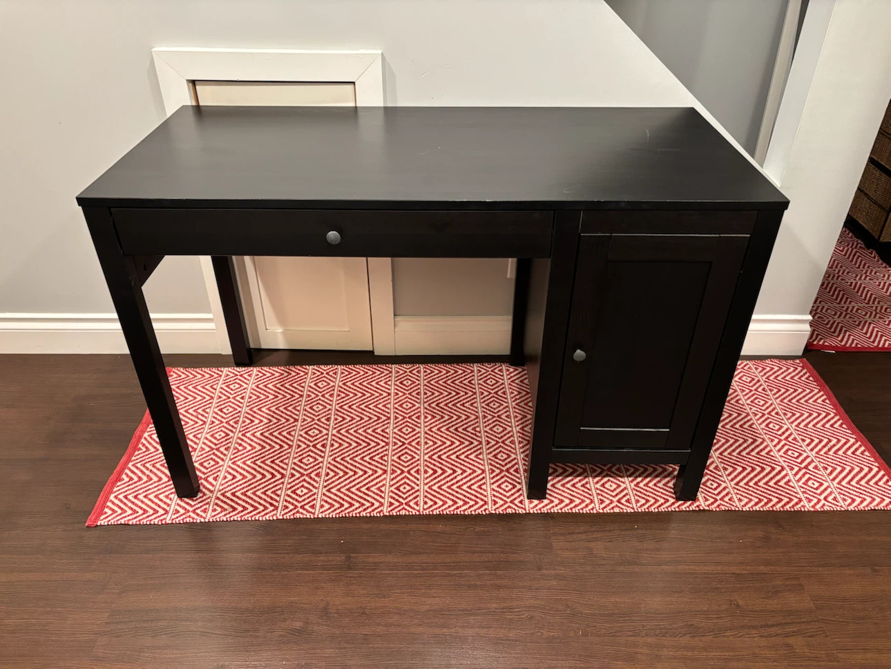 Black wooden desk with storage
