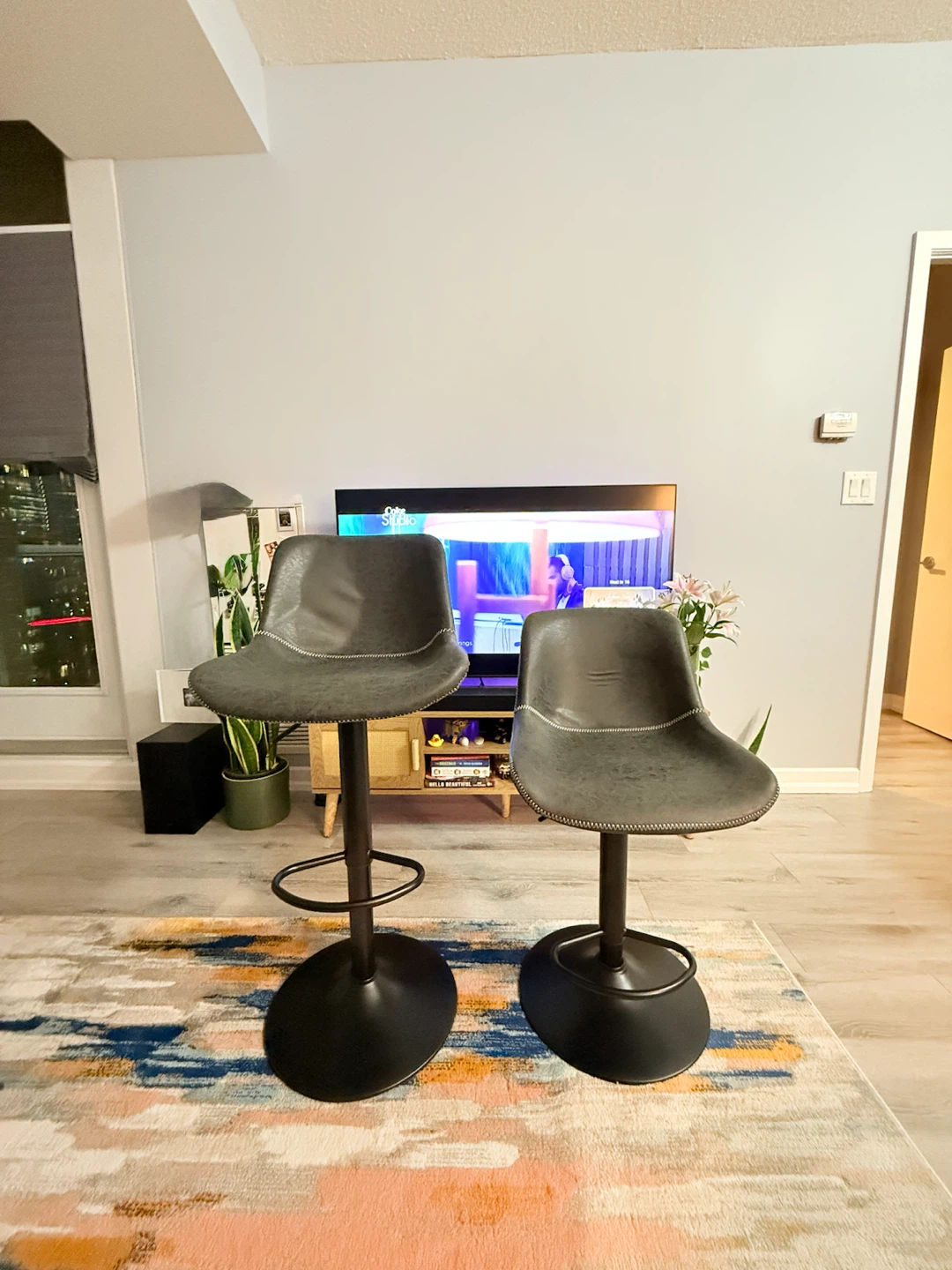 Two Grey Adjustable Bar Stools