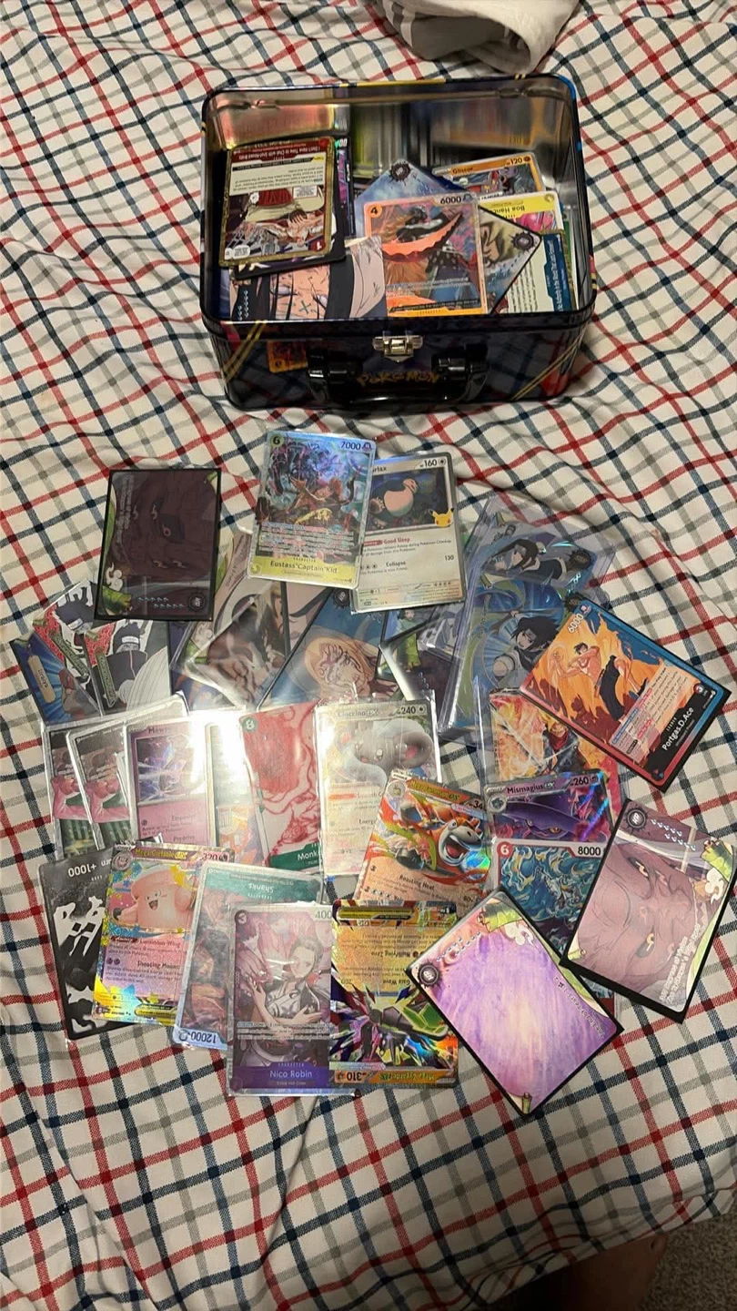 Assorted Trading Card Collection in Pokemon Tin
