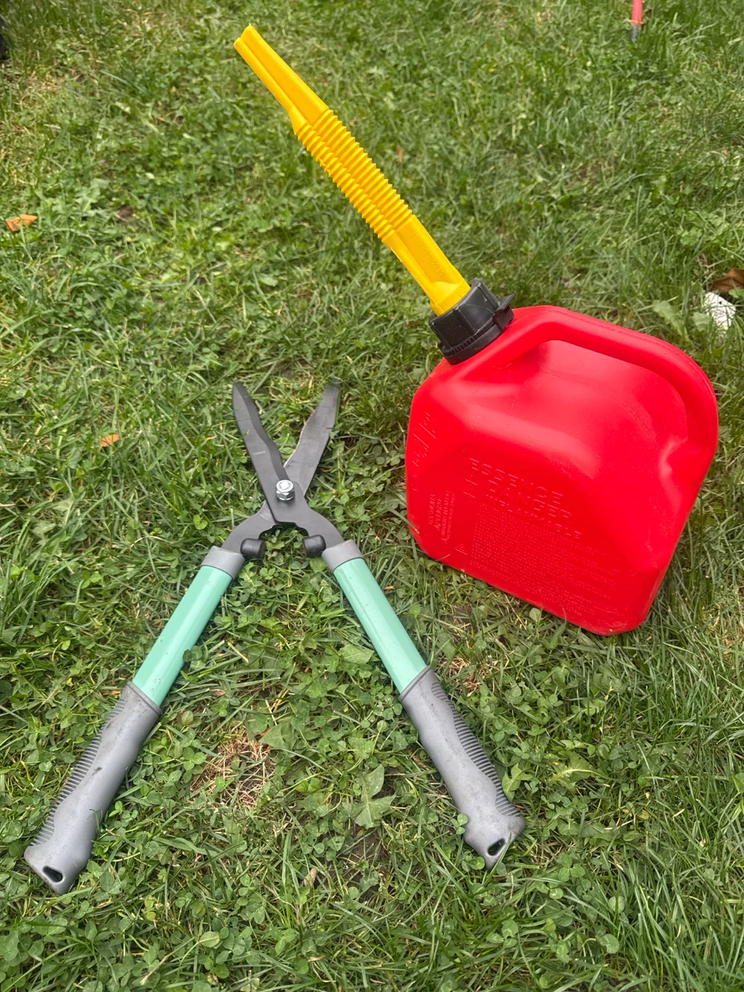 Gas can and hedge shears