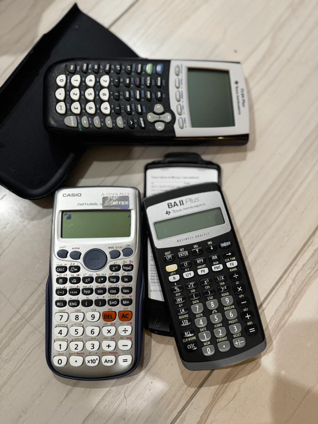 Assorted Calculators: Texas Instruments and Casio