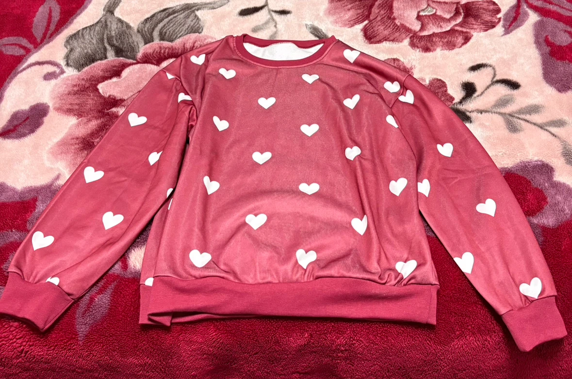 Pink heart print sweatshirt $10 Size Large.