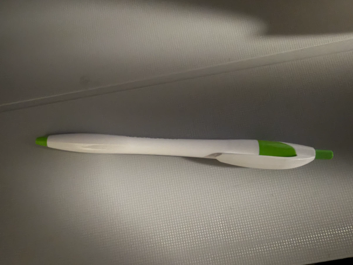 White and Green Retractable Ballpoint Pen