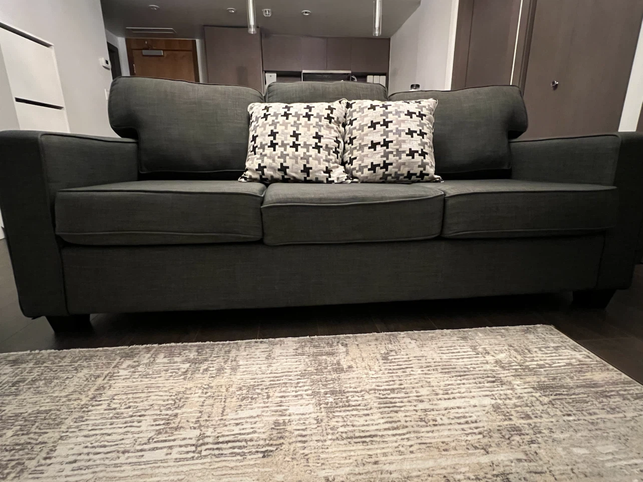 Dark grey fabric three-seater sofa - photo 3