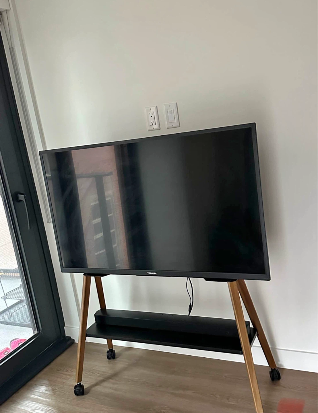 Excellent 50” TV with sound bar and moving stand