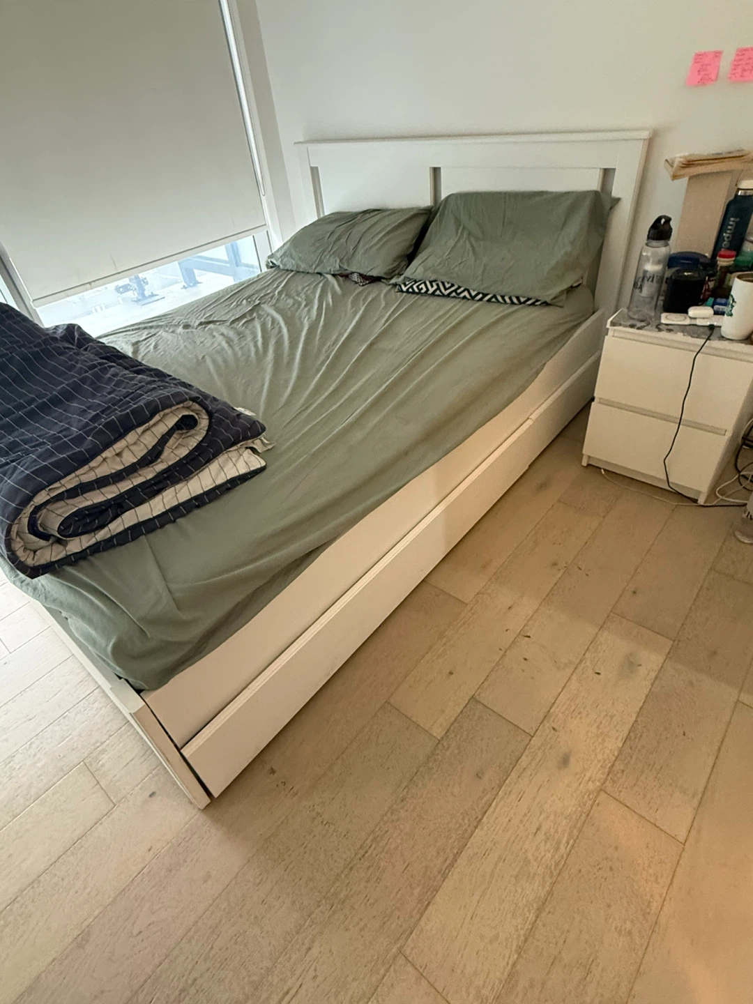 White IKEA Bed Frame with storage boxes