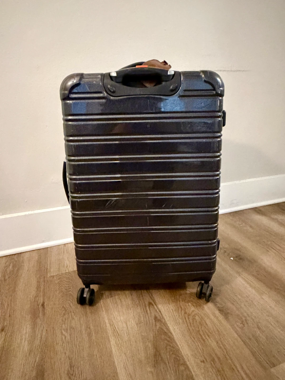 iFLY Black Hard-Shell Spinner Suitcase