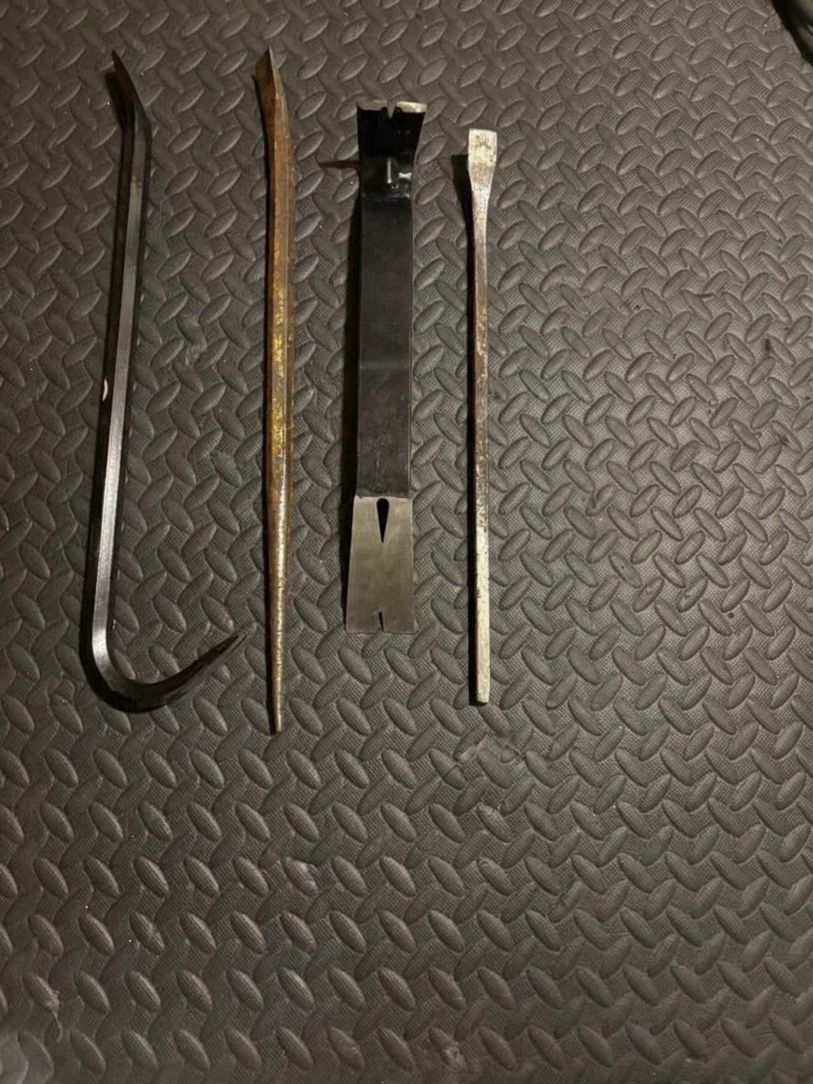 Various pry bars and nail pullers