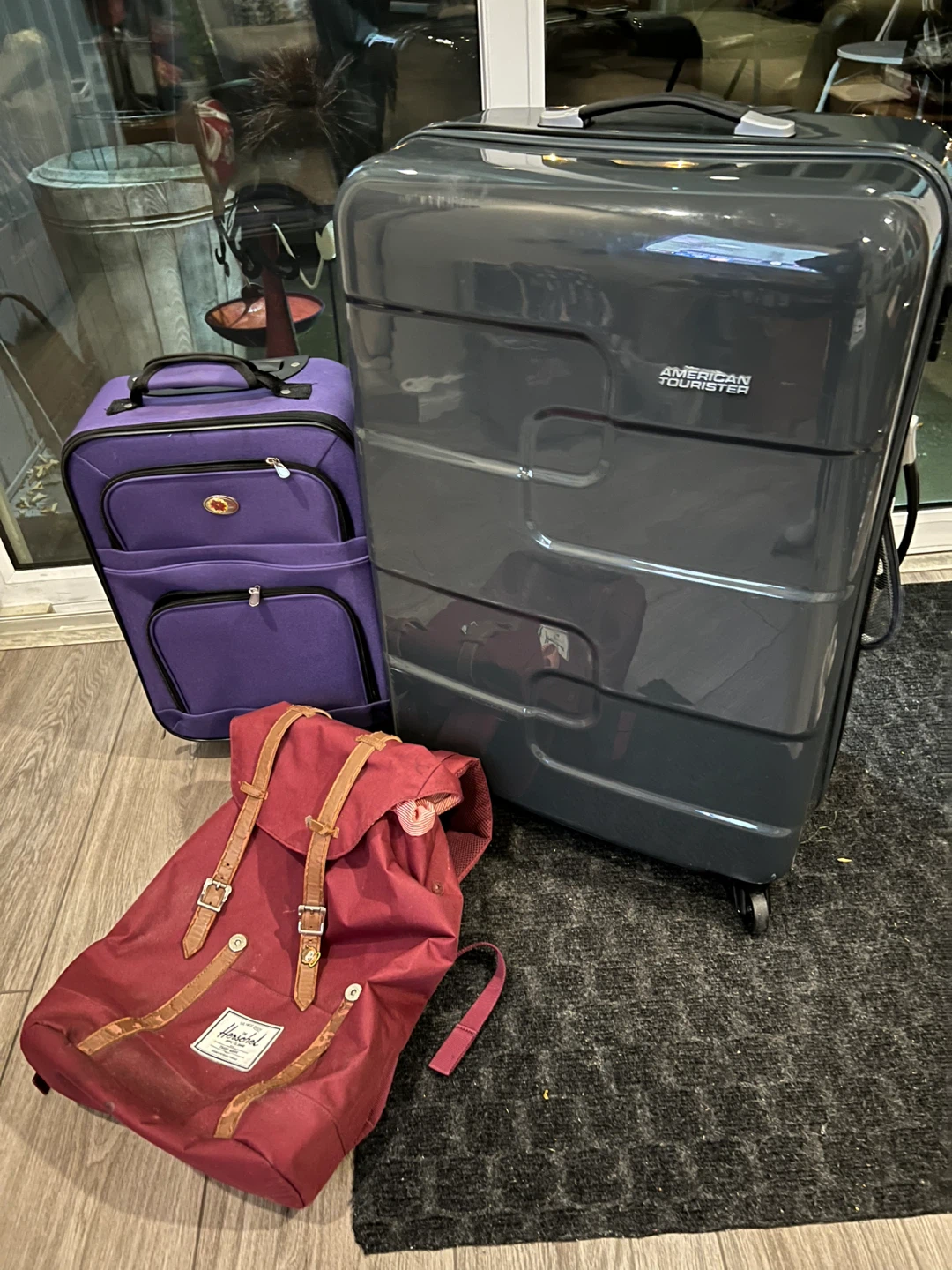 Suitcases with backpack.  Excellent condition