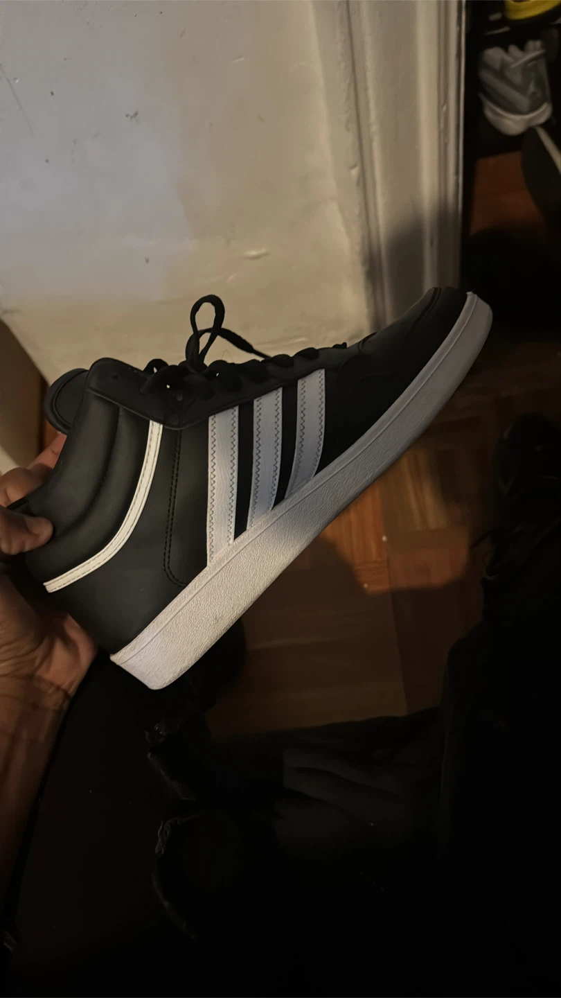 Adidas Black and White Mid-Top Sneakers