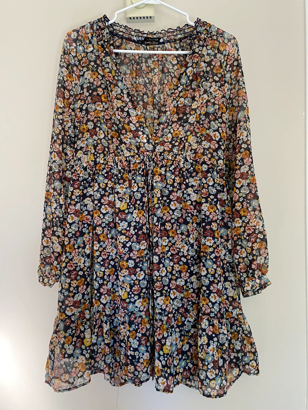 Three assorted women's dresses