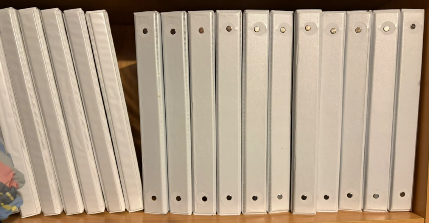 Assorted Staples and Avery Binders