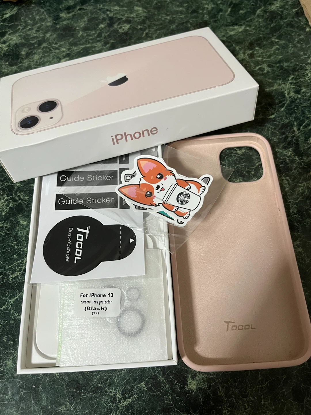 Empty iPhone 13 Box and a Pink Case