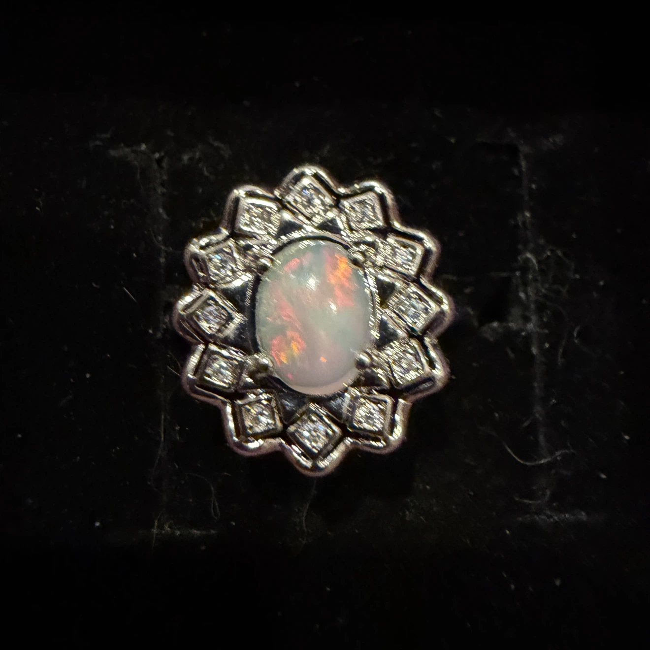 Oval Opal Ring with Surround Accent Stones