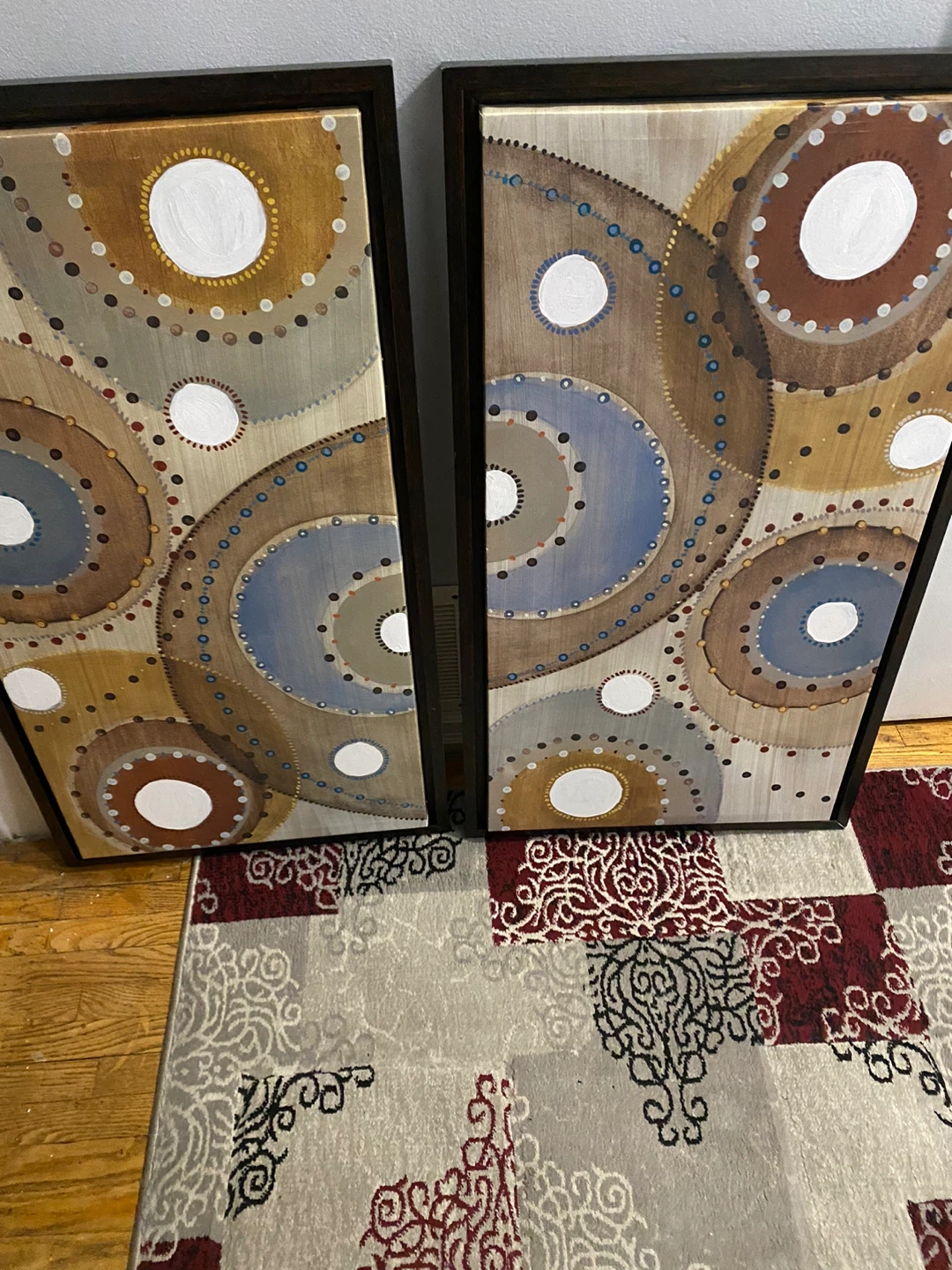 Set of two circular pattern canvas wall art