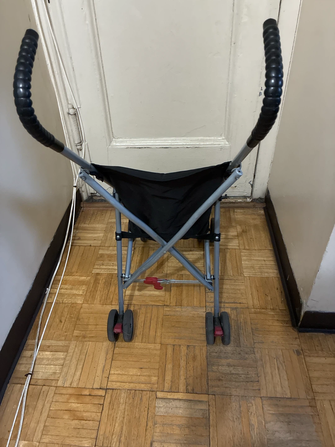Compact black umbrella stroller