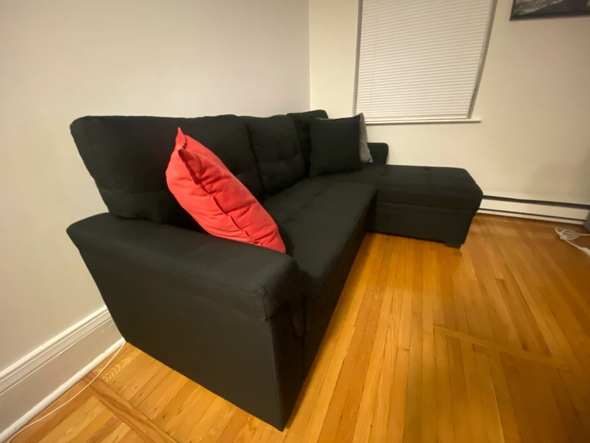 Black sectional sofa with pull-out bed - photo 2