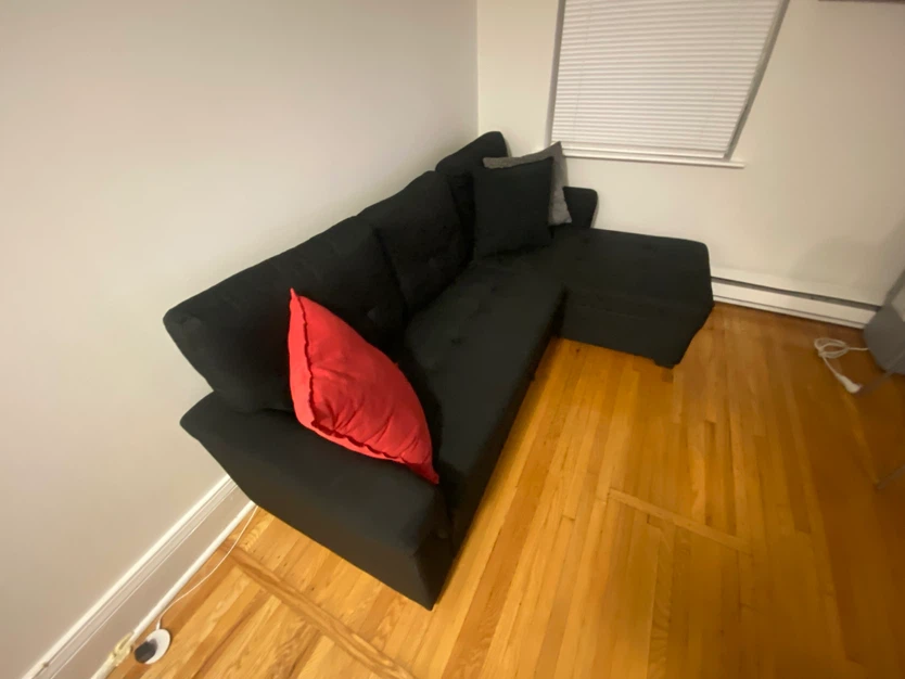 Black sectional sofa with pull-out bed - photo 3