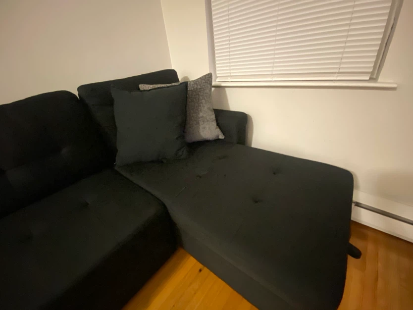 Black sectional sofa with pull-out bed - photo 4