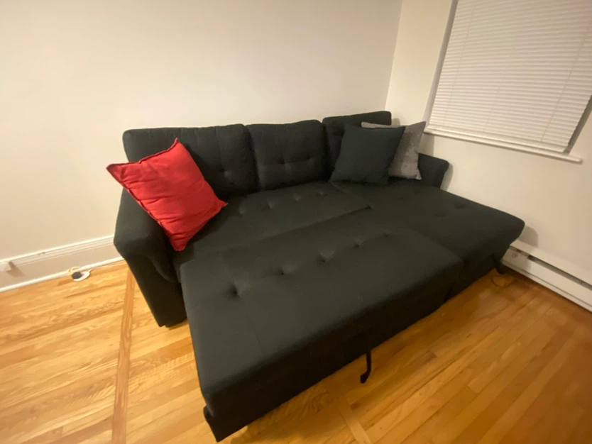 Black sectional sofa with pull-out bed - photo 5